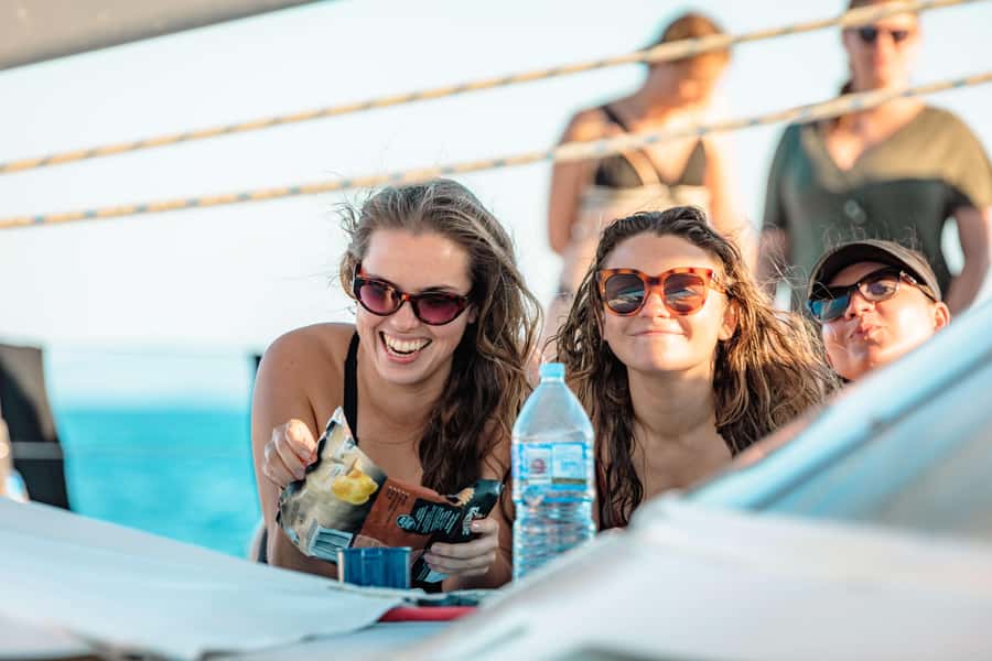 Airlie Beach: 2-Day Whitsunday Islands Sailing Snorkel Tour - Reef snorkeling on the Great Barrier Reef fringing reefs, with stinger suits and real choice