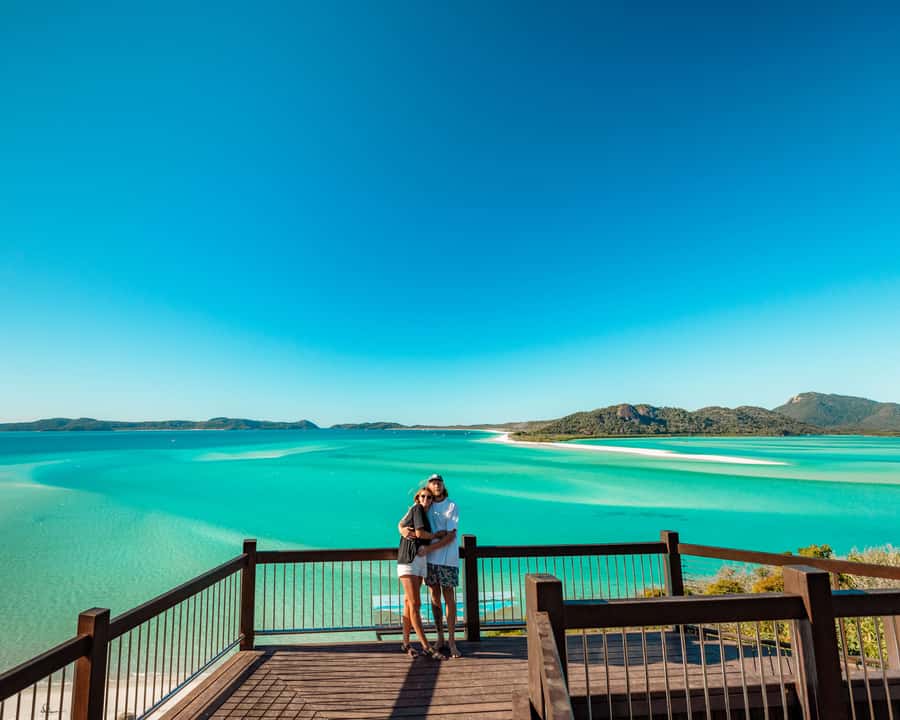 Airlie Beach: 2-Day Whitsunday Islands Sailing Snorkel Tour - Deck life: fast sailing, nets to lounge on, and crew-led group energy