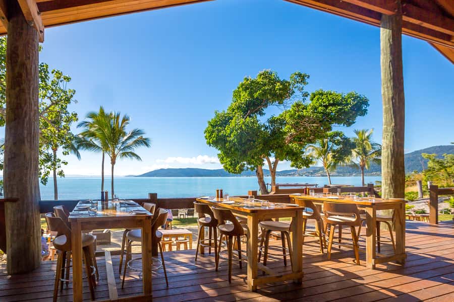 Airlie Beach: Cedar Creek Falls & Northerlies Beach Day Trip - Key highlights at a glance