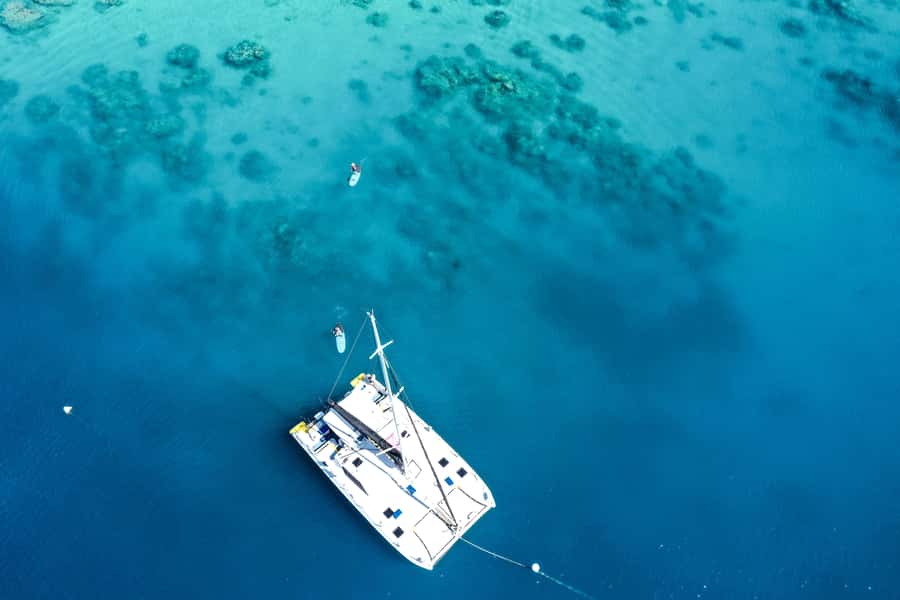 Airlie Beach: Whitsunday Islands Sailing, SUP & Snorkel Tour - Meals onboard: gourmet morning tea, lunch, and what BYO changes