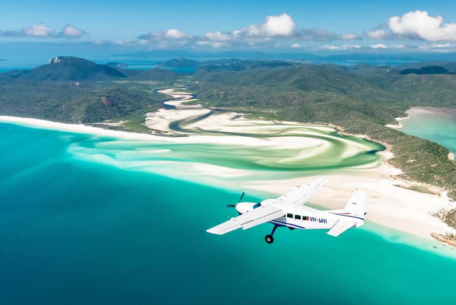 Airlie Beach: Whitsundays & Heart Reef Scenic Flight - The aircraft experience: fixed-wing, big windows, and headsets