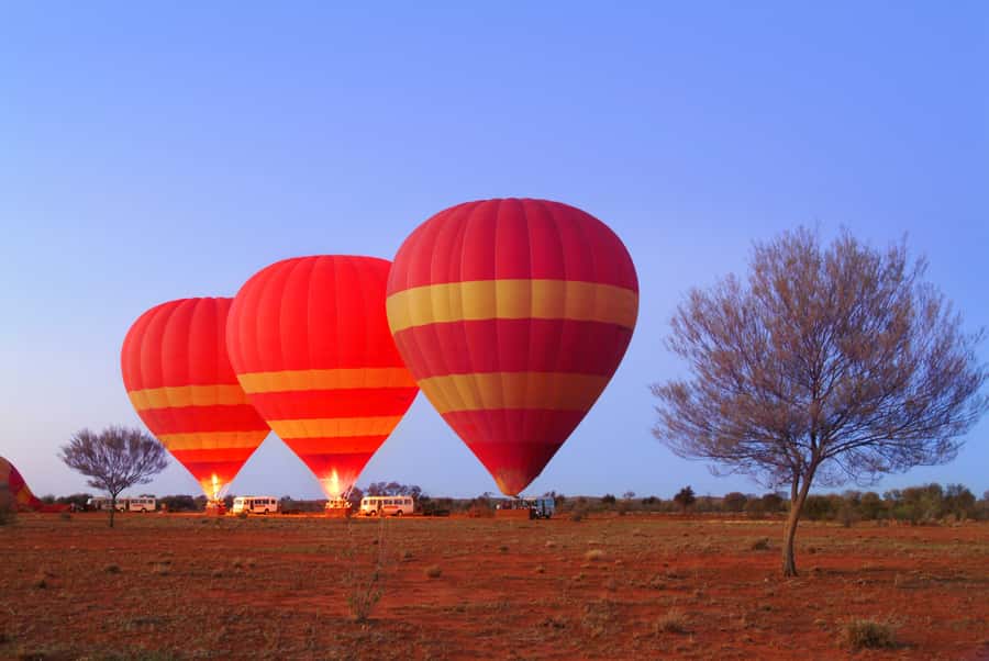 Alice Springs: Early Morning Hot Air Balloon Flight - Weather Checks and Burner Inflation Under a Rising Sky