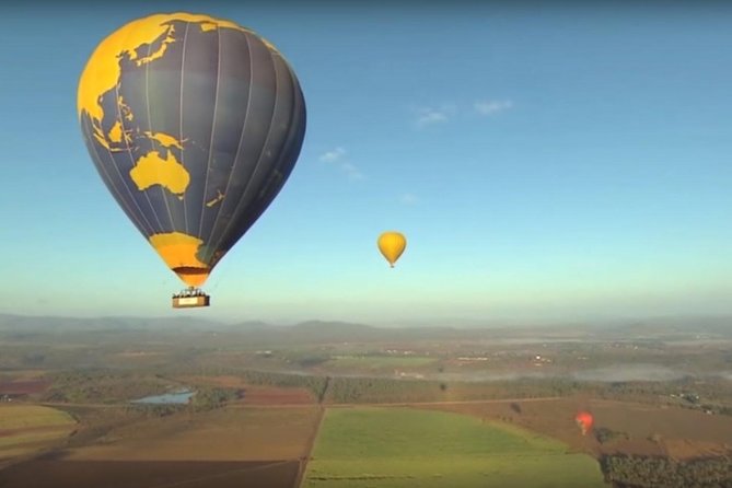 Cairns Classic Hot Air Balloon ride - In the air over Atherton Tablelands: fog, farms, rivers, and wildlife