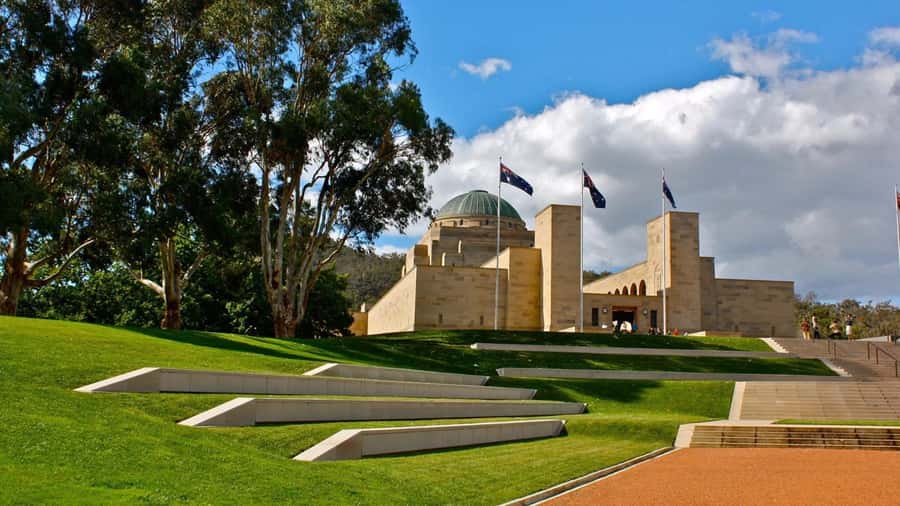 Canberra: City Highlights Day Tour with Entrance Fees - National Capital Exhibition: fast context before you enter Parliament mode