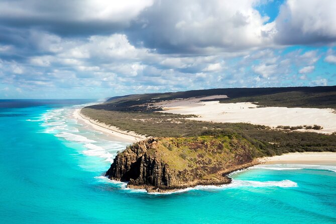 Dingos 3 Day K'Gari (Fraser Island) 4WD Tag-Along Tour - Day 2: Eli Creek, Maheno Shipwreck, and Champagne Pools