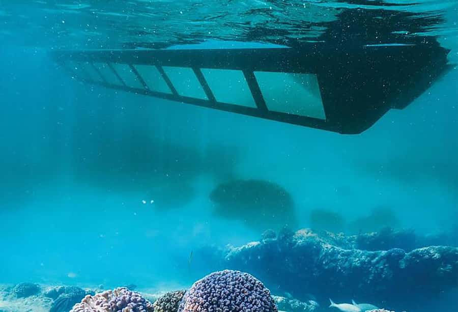 Exmouth: Ningaloo Semi-Submersible Glass Bottom Boat Tour - Cruising Tantabiddi Sanctuary Reef, minute by minute