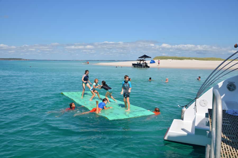 Fraser Island 4-Hour Eco-Sailing Adventure - The water toys: AquaMat and boom net, for balance and fun