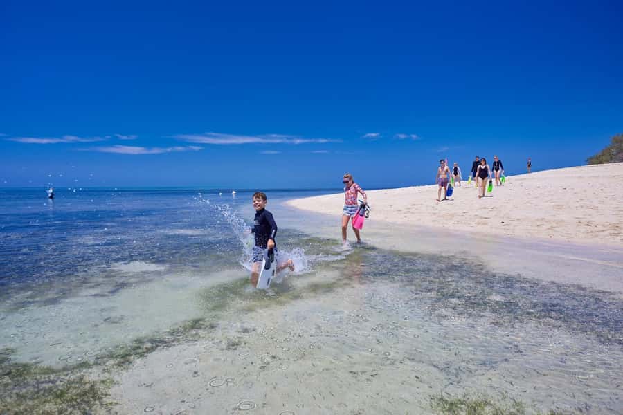 From Cairns: Green Island Full-Day Cruise - Snorkeling with provided gear, what to expect