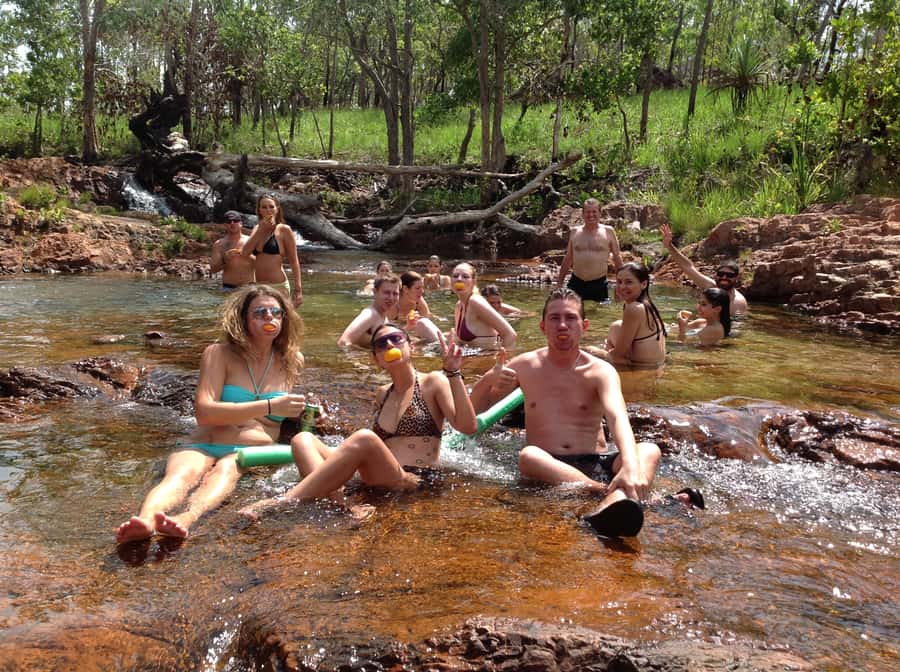 From Darwin: Litchfield Park Tour & Jumping Crocodile Cruise - Wangi Falls swim: your first true cooling-off moment