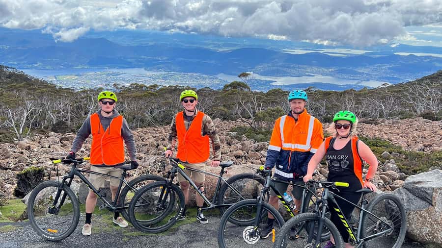 From Hobart: Mt Wellington Summit & Rainforest Bike Tour - Guides, safety, and pacing for mixed bike skills