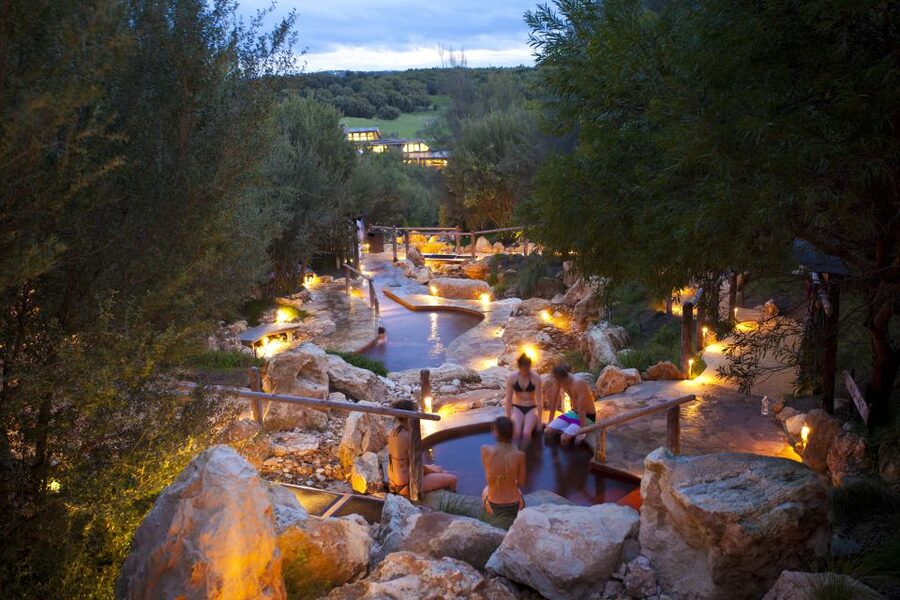 From Melbourne: Peninsula Hot Springs & Bathing Boxes Tour - Coach ride, pickup points, and the role of your guide