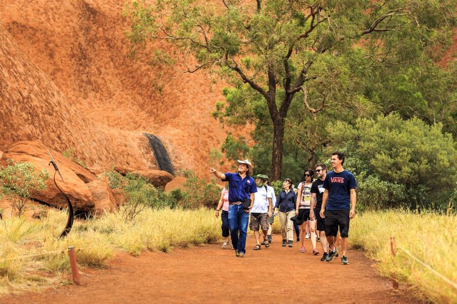 From Yulara: Uluru Tour and Sunset BBQ - What to bring for heat, flies, and short guided walks