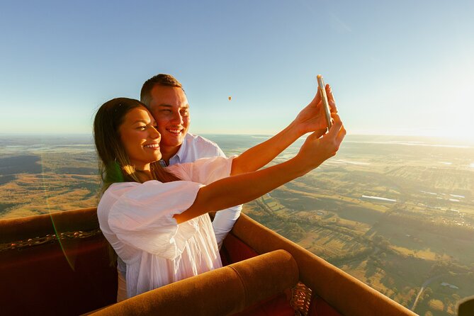Gold Coast Hot Air Balloon + Winery Breakfast + Return Transfers - In the air: forests, vineyards, pastures, and the calm of commentary