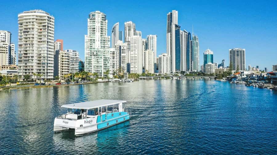 Gold Coast: Sightseeing Hop-on Hop-off Cruise - Onboard experience: captain commentary, music, and dolphin spotting