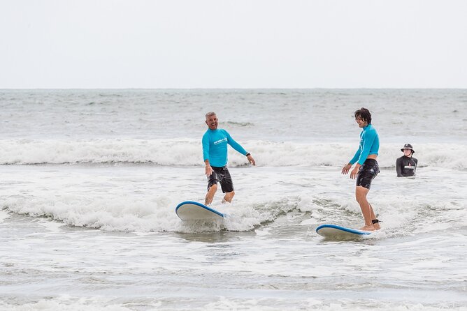 Learn to Surf at Noosa on the Sunshine Coast - The Beach Warm-Up: Safety Talk and Stand-Up Basics