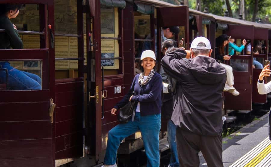 Melbourne: Half-Day Puffing Billy Steam Train Experience - Open carriages, view rails, and the reality of soot
