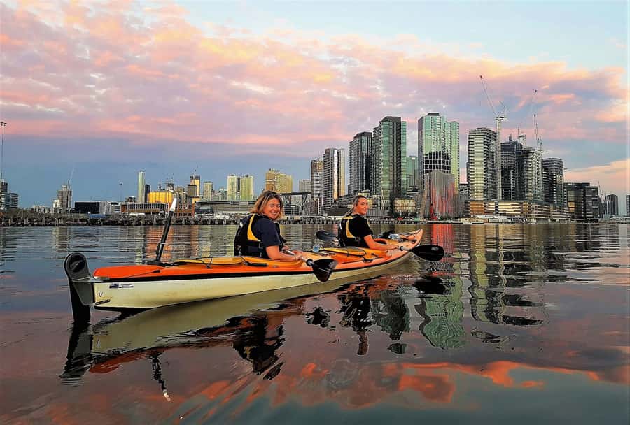Melbourne: Sunset Kayak Tour with Dinner - Getting to Docklands: Victoria Harbour, Dock Library, and a Bright Orange Hat