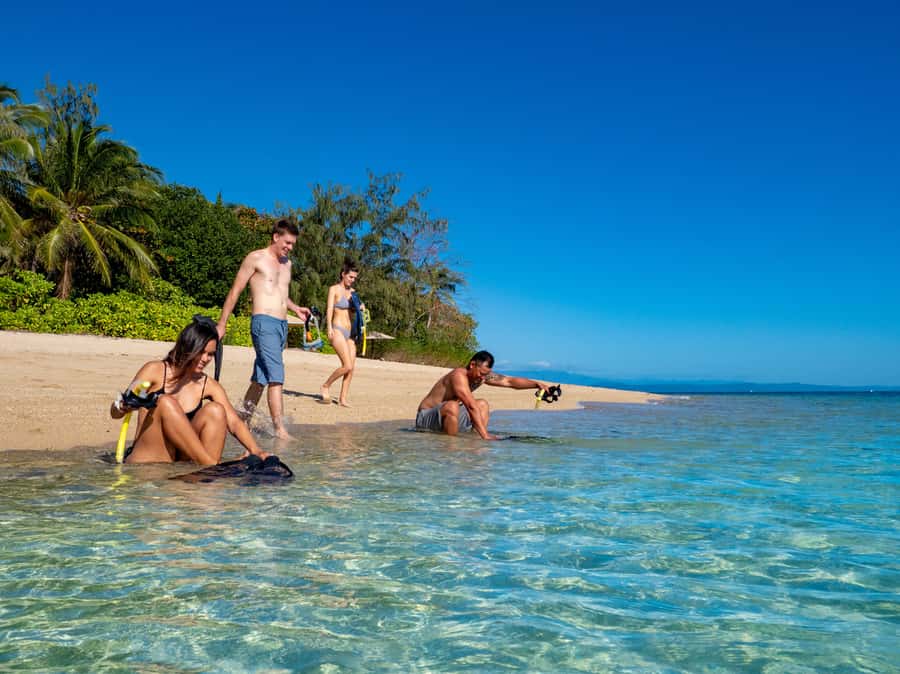 Port Douglas: Low Isles Glass Bottom Boat & Snorkeling Tour - Low Isles island time: lighthouse sights and space to breathe