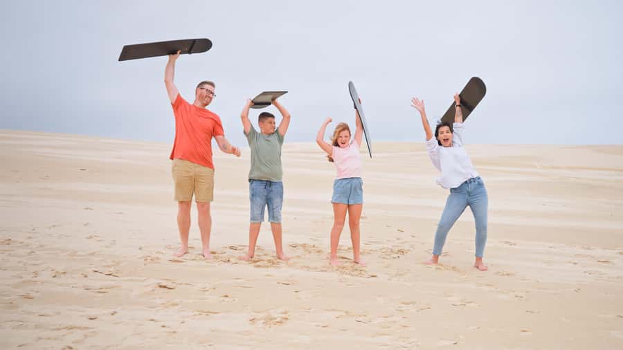 Port Stephens: Dolphin Cruise, Lunch, Koalas & Sandboarding - Nelson Bay dolphin cruise: turquoise water, smart dolphins, and optional boom netting