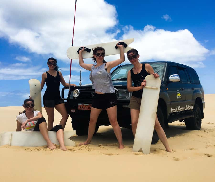 Port Stephens: Unlimited Sandboarding with 4WD Dune Transfer - Safety briefing first, then learning to ride shifting sand