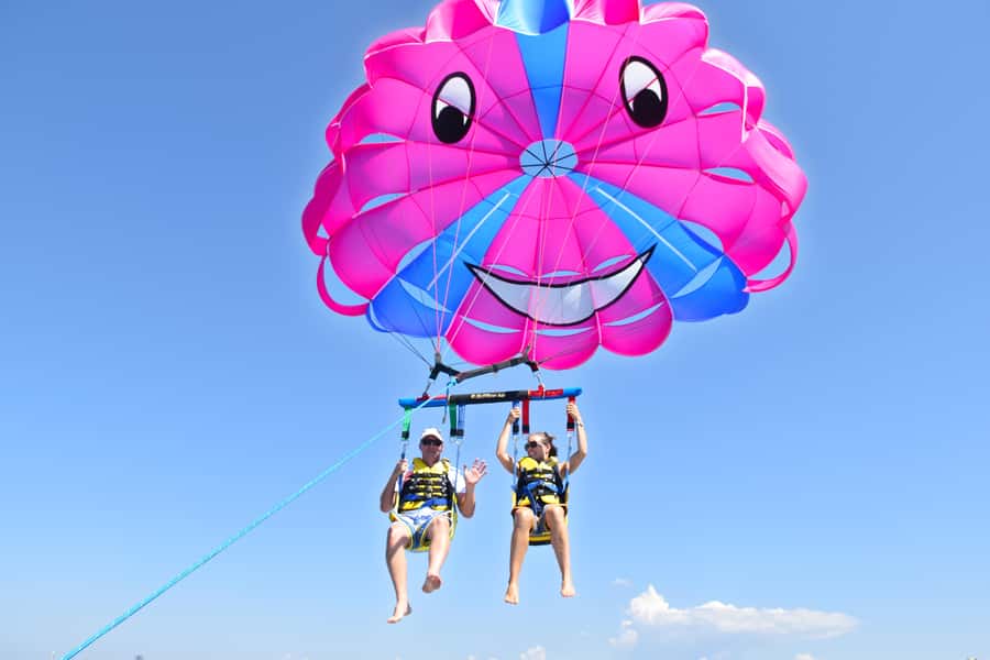 Surfers Paradise: Parasailing and Jet Ski Tour Package - Parasailing from Main Beach, lifted high with panoramic views