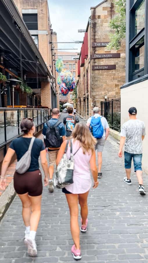 Sydney: City & The Rocks 3.5-Hour Walking Tour with a Drink - The Rocks: laneways, heritage precincts, and why the street layout matters