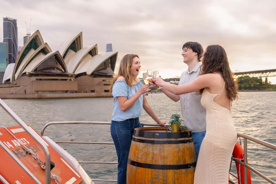 Sydney: Golden Glow Sunset Harbour Cruise with 1 Drink - Weather reality: when the sunset is cloudy or the rain shows up