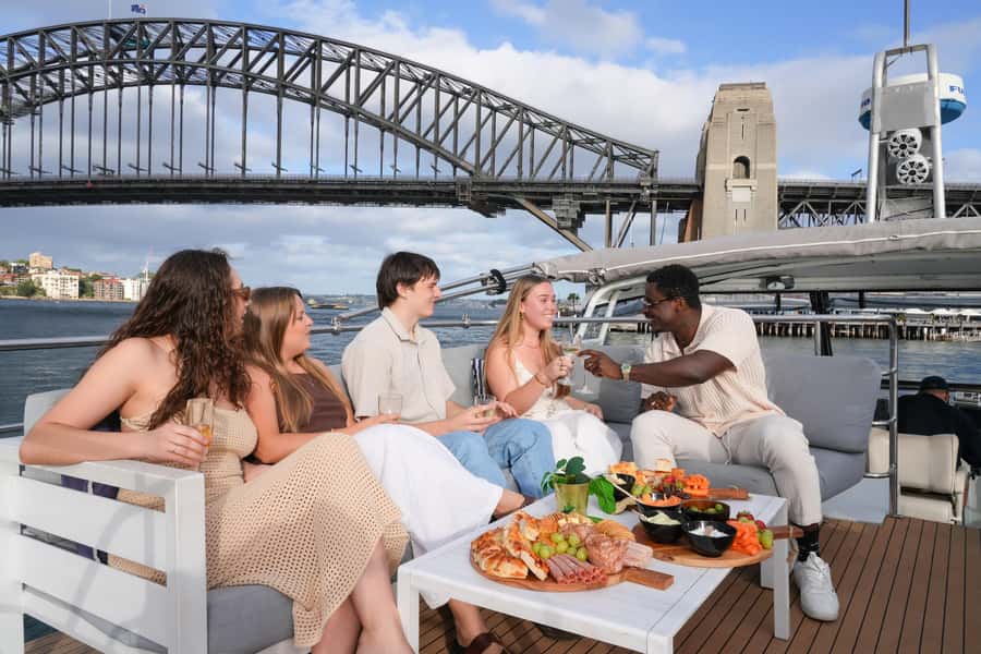 Sydney: Golden Glow Sunset Harbour Cruise with 1 Drink - Where you meet at Aquarium Wharf and how the sunset timing works