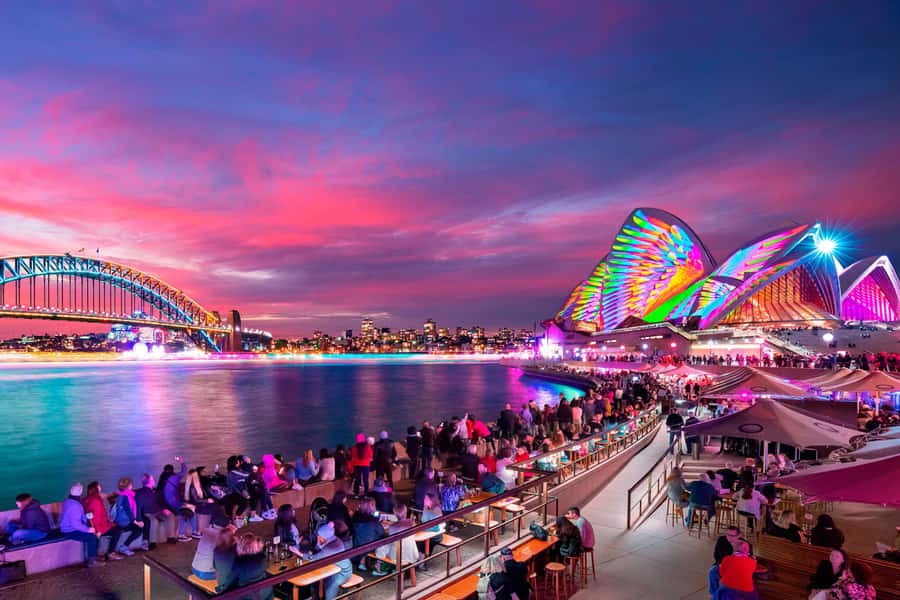 Sydney: Premium Catamaran Vivid Cruise with Welcome Drink - The “route feeling”: Harbour Bridge and Opera House lighting up close