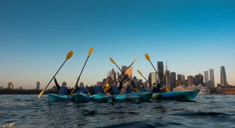 Sydney Sunrise Kayak Tour on Sydney Harbour - Sydney Opera House sightseeing, with the city waking up behind it
