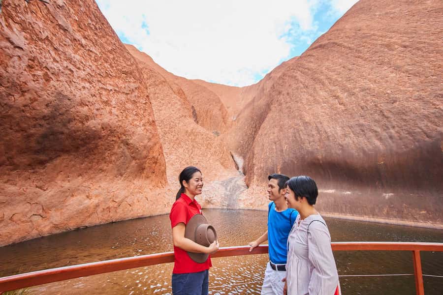Uluru: Sacred Sites & Sunset Tour with Wine & Cheeseboard - Mutitjulu Waterhole and rock art: the sacred-site part that actually sticks